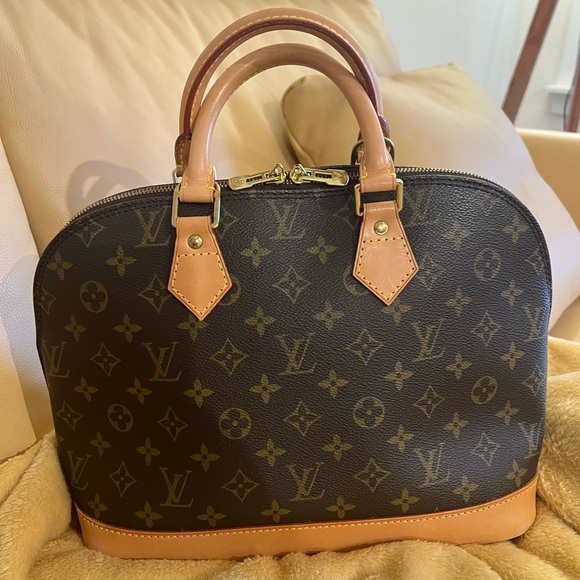 Louis Vuitton Alma PM Monogram Handbag. - Picture 1 of 15